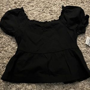 Girls never worn black top